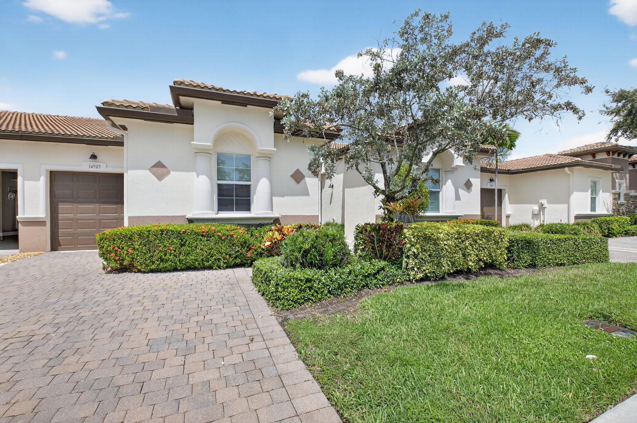 Beautifully upgraded ''Adrano'' 3 bedroom/3 bath and 1 car garage villa on private lushly landscaped lot.This freshly painted home features white wood cabinetry, granite counter tops, designer backsplash,stainless steel appliances, fixtures, fans, pendant lights, NEW A/C (2025) with warranty, designated laundry room with upper cabinetry, new washer, recent dryer vent cleaning, full house filtration system, new bulb-less hi-hats, dual sinks in primary bathroom, soaker tub, free standing shower, enlarged screen patio with picture window and retractable power awning.Villaggio Reserve is an active 55+ community with a 38,000 sq ft clubhouse with a resort style pool, lap pool, kiddie pool, jacuzzi, cafe, fitness center, 6 pickleball and 5 tennis courts and 2 bocce ball courts.