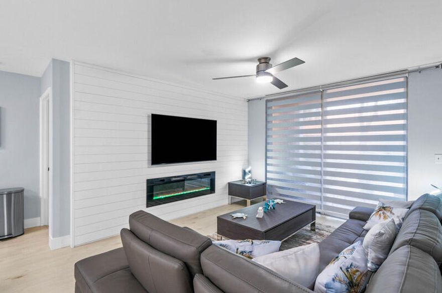 INVESTORS WELCOMED...FULLY FURNISHED....TURNKEY. Leased through September 1st, 2026, and leased Jan 1st,2027-March 31st, 2027. Nestled along the Intracoastal Waterway, this 2-bedroom, 2-bathroom condo offers an ideal escape with its prime location and well-designed features. The unit presents a seamless blend of modern elegance and coastal charm, providing a comfortable and inviting retreat for those looking to enjoy the beauty of the waterfront. Upon entering the condo, guests are welcomed into a tastefully decorated living space that maximizes natural light, creating an airy and pleasant atmosphere. The open-concept layout enhances the sense of space, allowing for easy movement between the living area and the fully equipped kitchen.  The kitchen, adorned with sleek countertops and stainless steel appliances, provides a stylish and functional space for preparing meals.    Residents have access to a range of amenities within the condo complex for leisure and recreation. A sparkling pool provides a refreshing oasis for residents to unwind and soak up the sun. The condo's location is a key highlight, placing residents in close proximity to a variety of dining, shopping, and entertainment options along the waterfront. Explore local seafood restaurants, boutique shops, and cultural attractions that contribute to the vibrant and dynamic atmosphere of the area.  Water enthusiasts will appreciate the proximity to marinas and the availability of water-based activities. Whether renting a boat for a day of exploration or kayaking along the waterway, there are plenty of opportunities to embrace the coastal lifestyle.