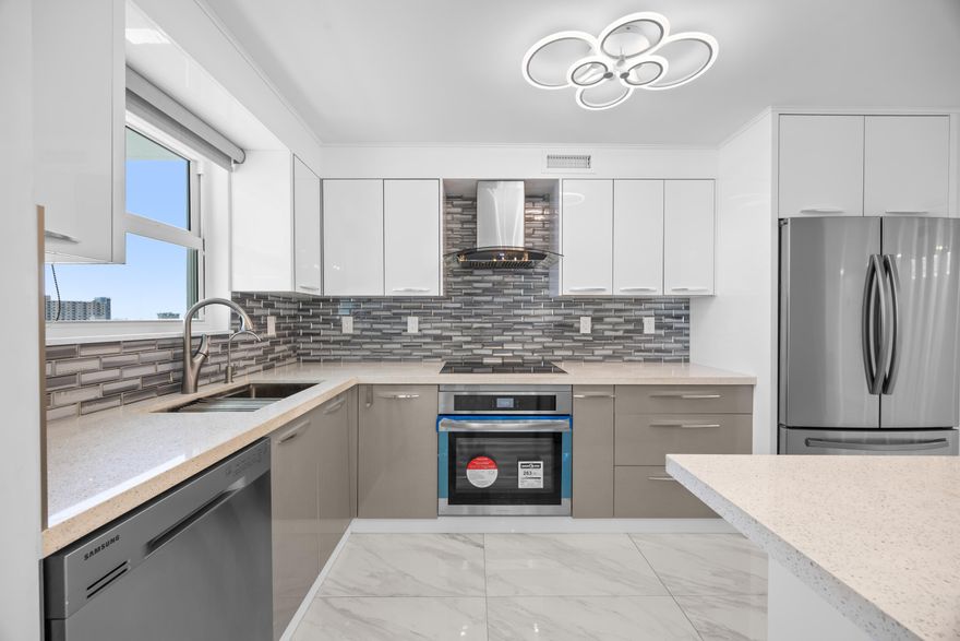 Fully remodeled 3 bed, 3 bath corner condo available from May 28th (currently tenant occupied). The unit has brand-new hurricane-impact windows and doors with UV tint, a modern Italian-style kitchen with stainless steel appliances, quartz countertops, and porcelain floors. Bathrooms are nicely updated, and there are solid wood doors, high baseboards, a walk-in closet, and extra shoe storage. Assigned covered parking spot. Great for boaters, with a new dock offering water and electricity. The building also has a pool overlooking the Intracoastal, gym, saunas, BBQ area, and updated common areas with security throughout. Well managed community.