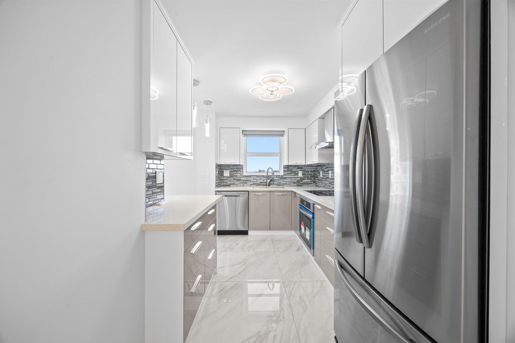 Photo of 137 Golden Isles Drive #914, Hallandale Beach, FL 33009 (MLS # B26008138)