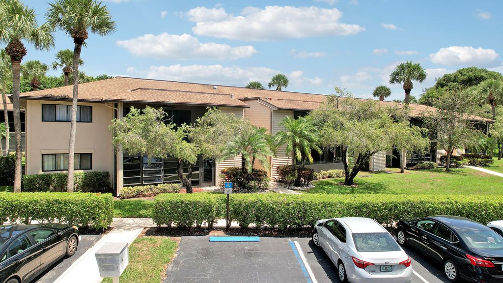 Photo of 15484 Lakes Of Delray Boulevard #103, Delray Beach, FL 33484 (MLS # B26030701)
