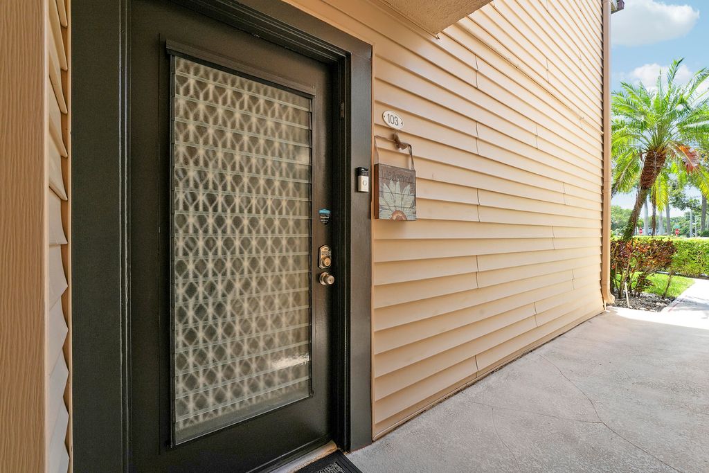 Photo of 15484 Lakes Of Delray Boulevard #103, Delray Beach, FL 33484 (MLS # B26030701)