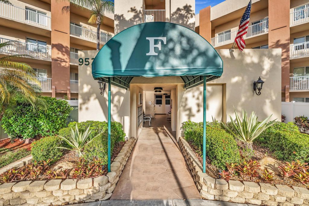 Photo of 9539 Weldon Circle #F107, Tamarac, FL 33321 (MLS # B26012969)