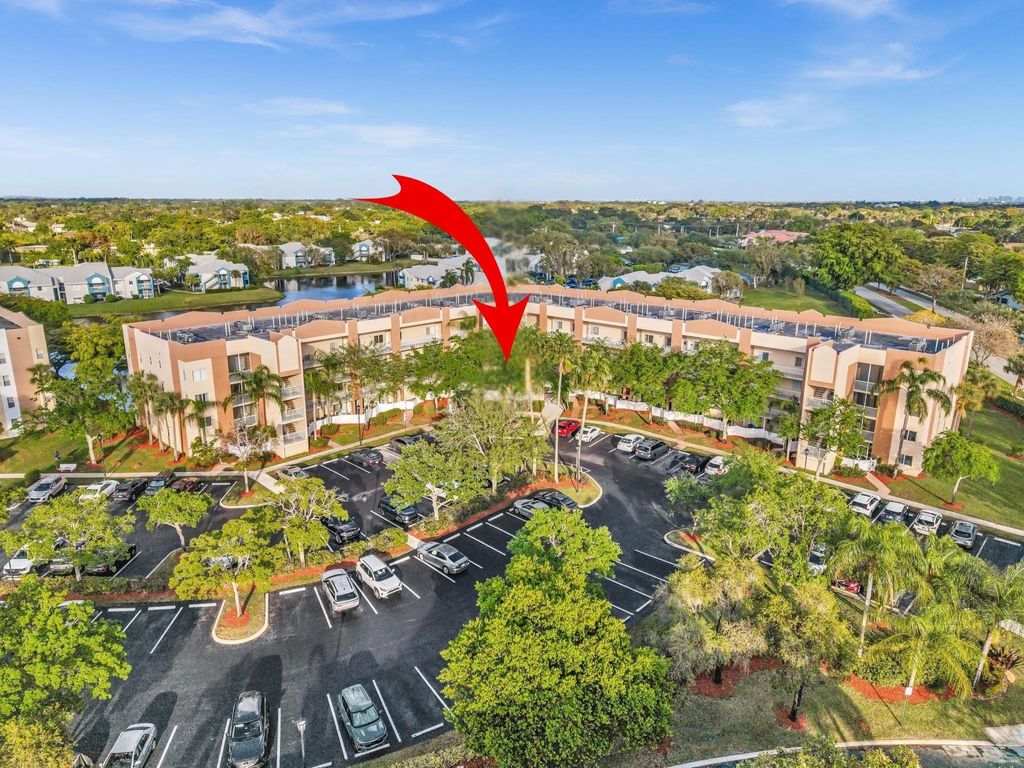 Photo of 9539 Weldon Circle #F107, Tamarac, FL 33321 (MLS # B26012969)