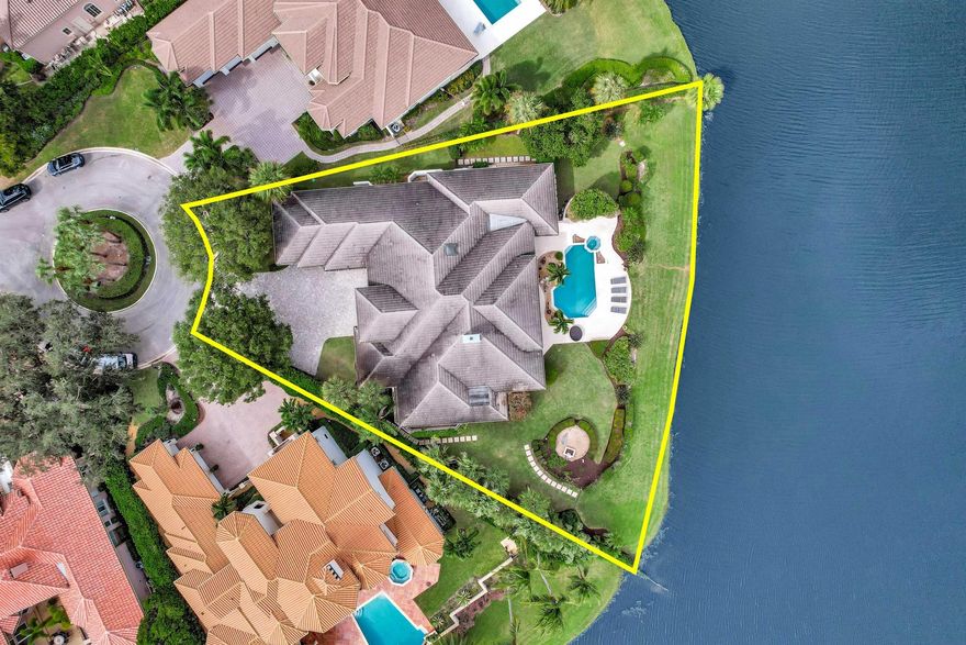 Welcome to one of the most coveted addresses in The Loxahatchee Club. Perfectly positioned at the end of a quiet cul-de-sac, this exceptional point lot offers some of the most spectacular golf and water views in the entire community. With sweeping vistas in every direction, this property represents a truly rare opportunity. The existing residence is move-in ready, offering comfortable living from day one — yet it also serves as the perfect canvas for a major renovation or an extraordinary new build. Premier lots of this caliber are few and far between. Beyond the property, residents of The Loxahatchee Club enjoy world-class amenities including 18 holes of championship golf on a Jack Nicklaus Signature course with a renowned caddie program, a newly renovated clubhouse designed in classic British West Indies style, a state-of-the-art fitness center, spa, tennis courts, and exceptional dining.
This is timeless, understated elegance at its best  and an opportunity to own one of the finest locations within Jupiter's best-kept secret.