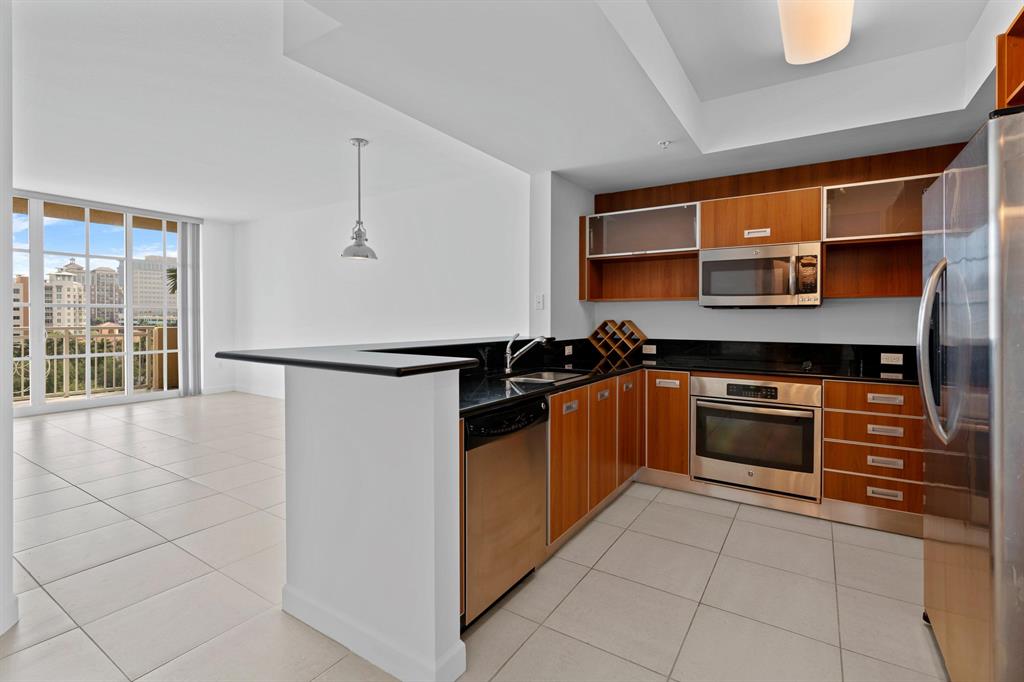Panoramic City Views from the perfect Pied a Terre in downtown West Palm Beach. This one bedroom condo in The Whitney, features nearly 800 sq ft as well as a half bath. Complete with granite counter tops and stainless steel appliances, not to mention new flooring, and an amazing courtyard/city view from the south facing balcony. The Whitney is located at the pulse of Downtown West Palm Beach with less than 2 blocks away from all you could desire. Dining, shopping, entertainment, nightlife, and the amazing company of the intracoastal. Come ready to make this your home.