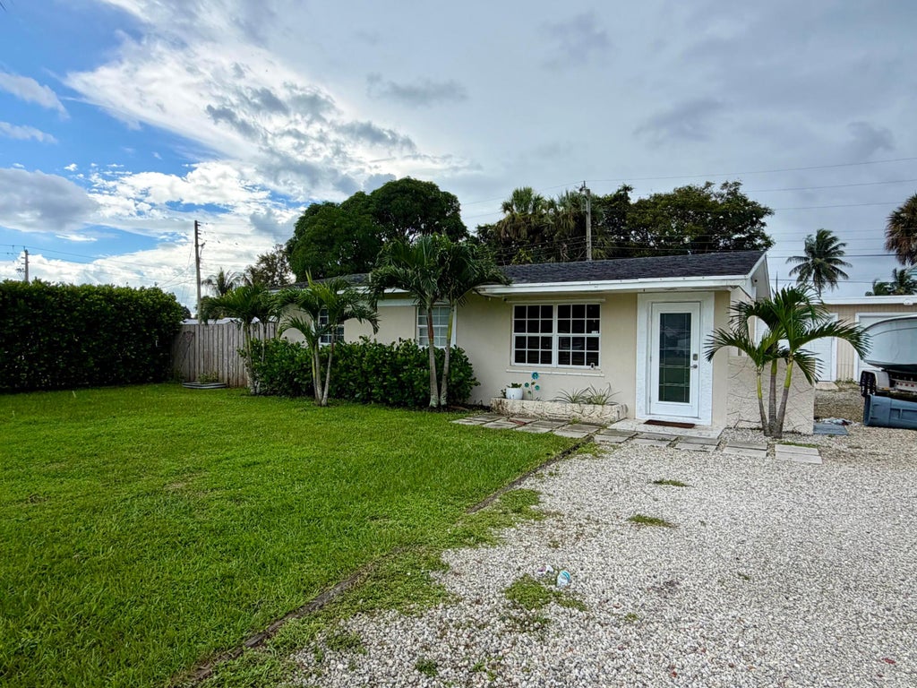 Photo of 3540 Amy Avenue, West Palm Beach, FL 33403 (MLS # B26079379)