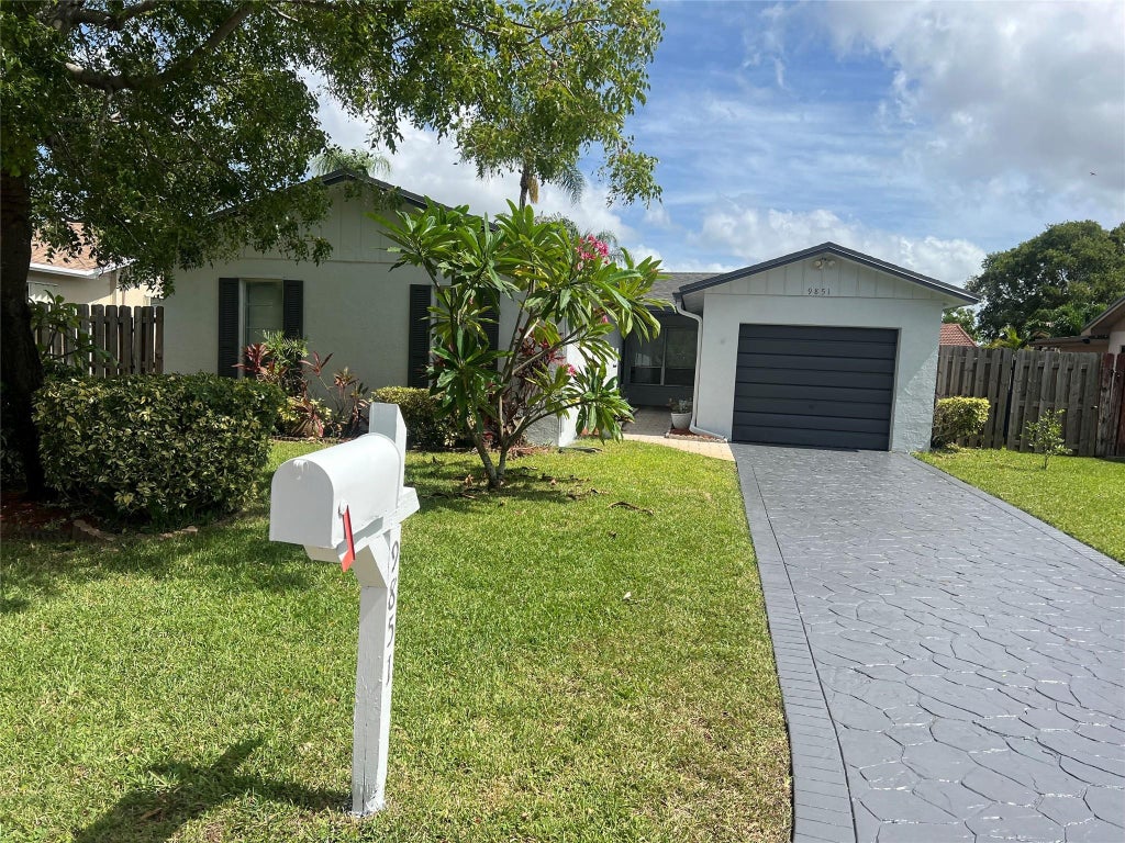 Photo of 9851 NW 24th Street, Coral Springs, FL 33065 (MLS # F10511266)