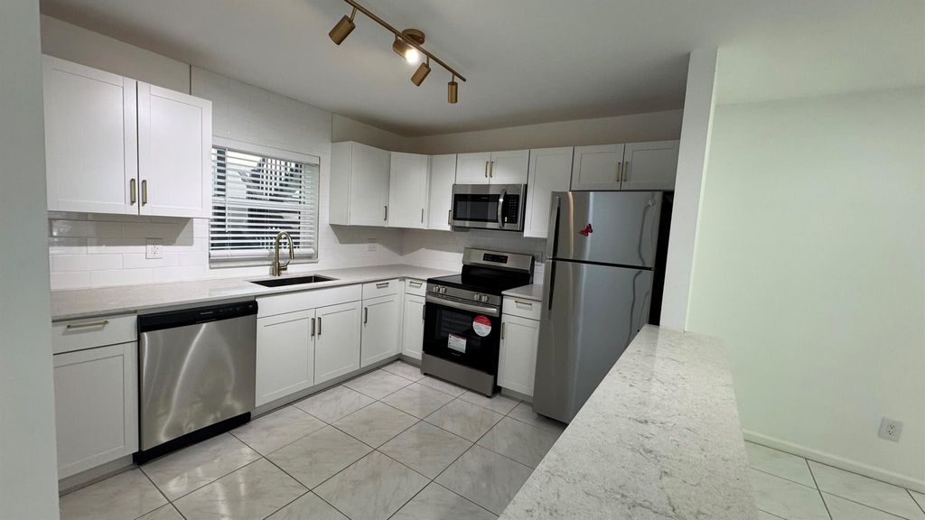 Photo of 6531 SE Federal Highway #J104, Stuart, FL 34997 (MLS # R11115402)