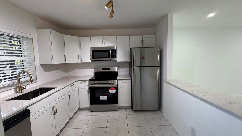 Photo of 6531 SE Federal Highway #J104, Stuart, FL 34997 (MLS # R11115402)