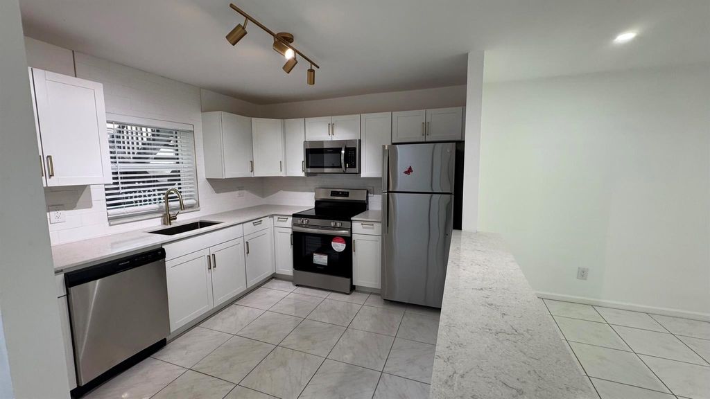 Photo of 6531 SE Federal Highway #J104, Stuart, FL 34997 (MLS # R11115402)