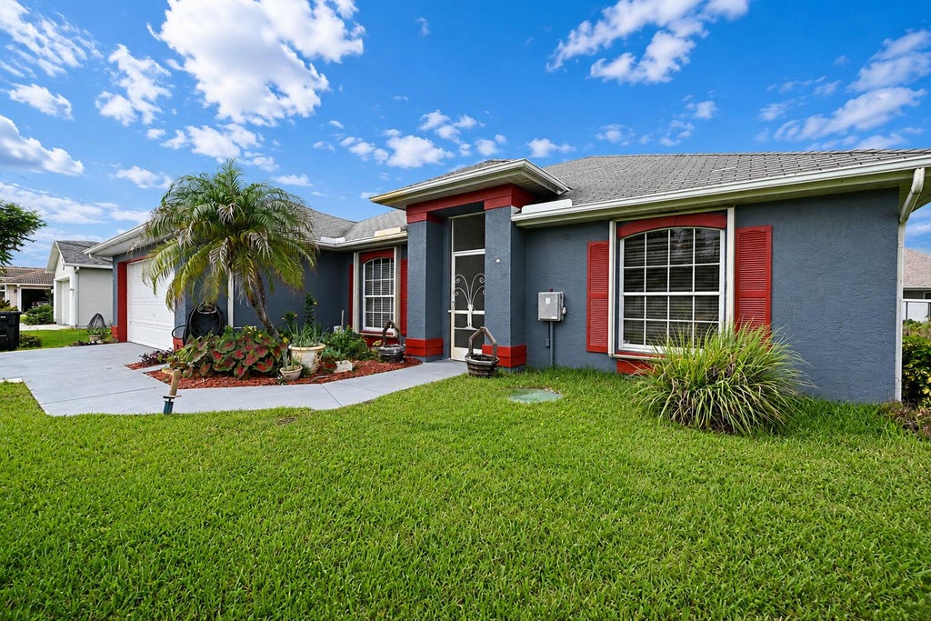 Photo of 5951 NW Brenda Circle, Port Saint Lucie, FL 34986 (MLS # B26073135)