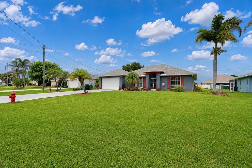 Photo of 5951 NW Brenda Circle, Port Saint Lucie, FL 34986 (MLS # B26073135)