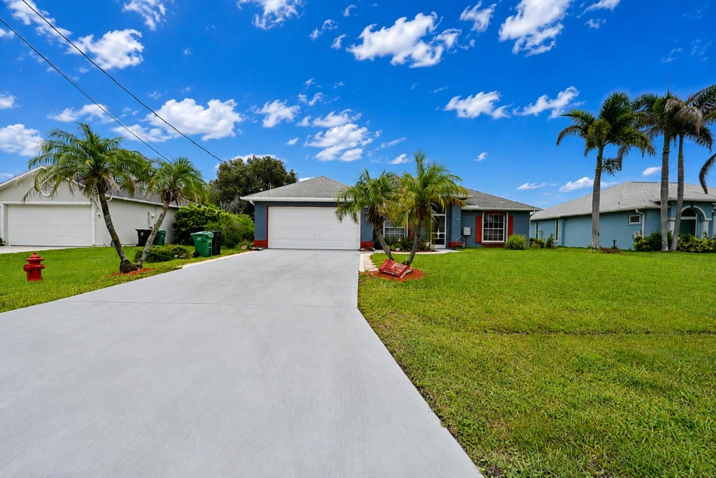 Photo of 5951 NW Brenda Circle, Port Saint Lucie, FL 34986 (MLS # B26073135)
