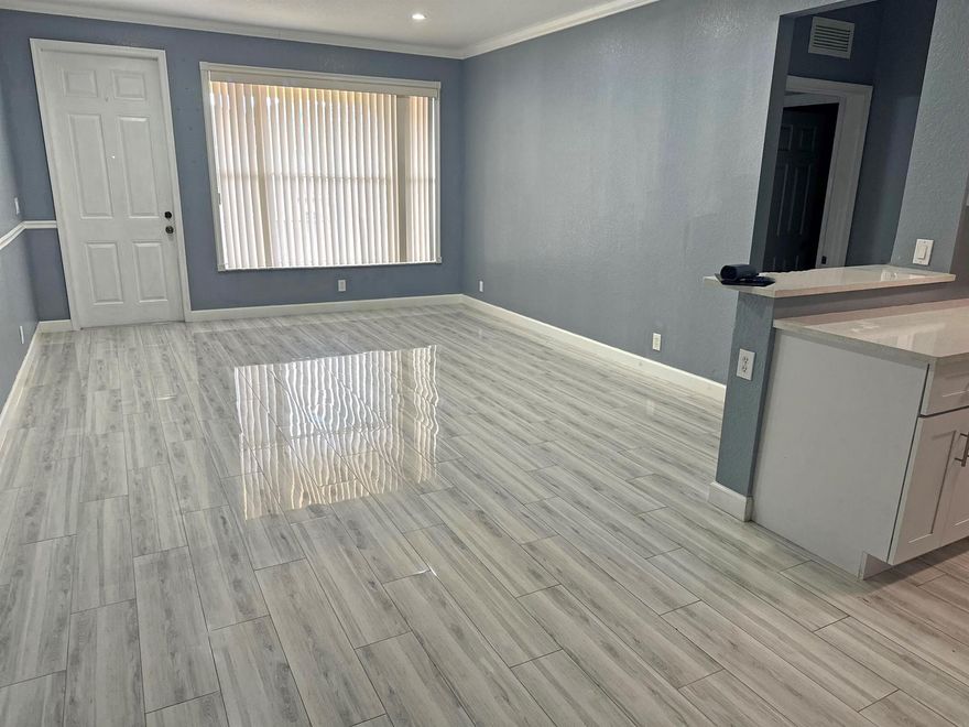 Gorgeous renovated 2 Bedroom 2 Bathroom condo located in the gated Rosemont community. This home boasts updated white kitchen cabinets and granite counter tops. Beautiful porcelain tile floor, crown molding, updated bathrooms and washer and dryer in the unit. Enjoy the privacy of a separate private gate to your second-floor residence with open patio. Rosemont offers a community clubhouse, pool, fitness center and kids playground. Centrally located to shopping, fine dining and major highways. All ages and pets welcome! NO SMOKERS!