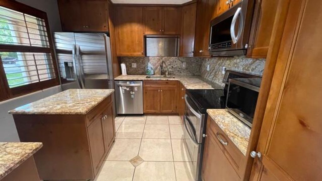 Photo of 108 Lake Irene Drive, West Palm Beach, FL 33411 (MLS # R10700322)