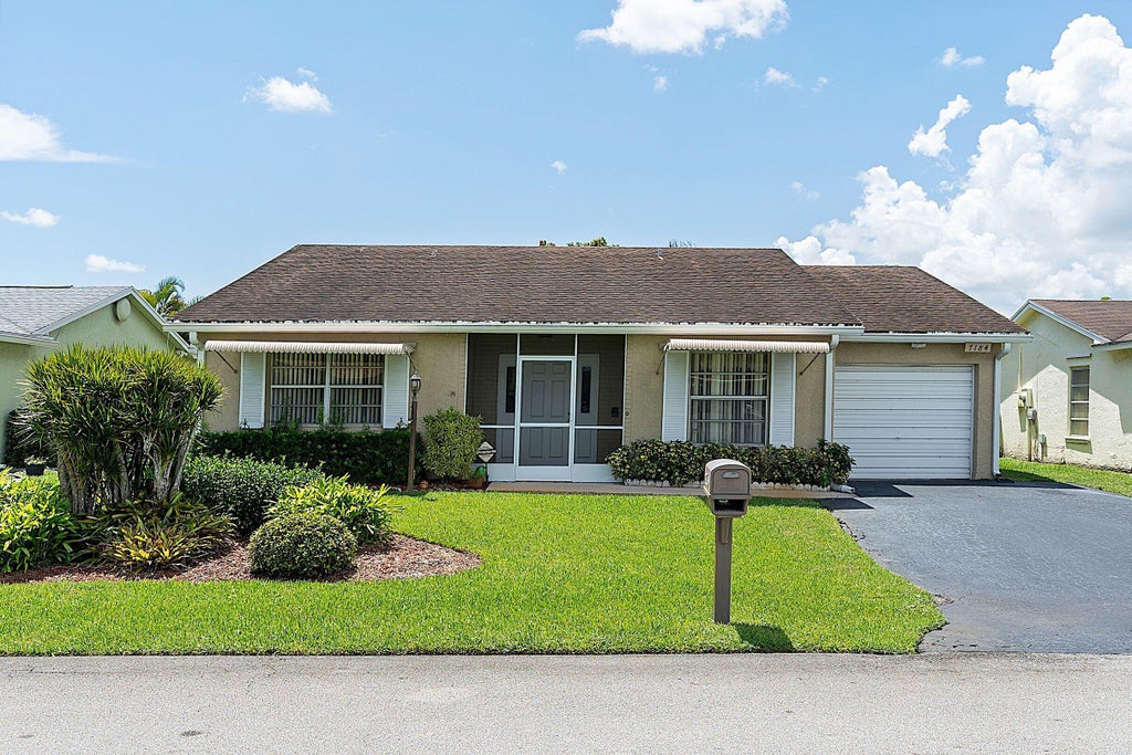 Photo of 7184 PINE MANOR Drive, Lake Worth, FL 33467 (MLS # B26070564)