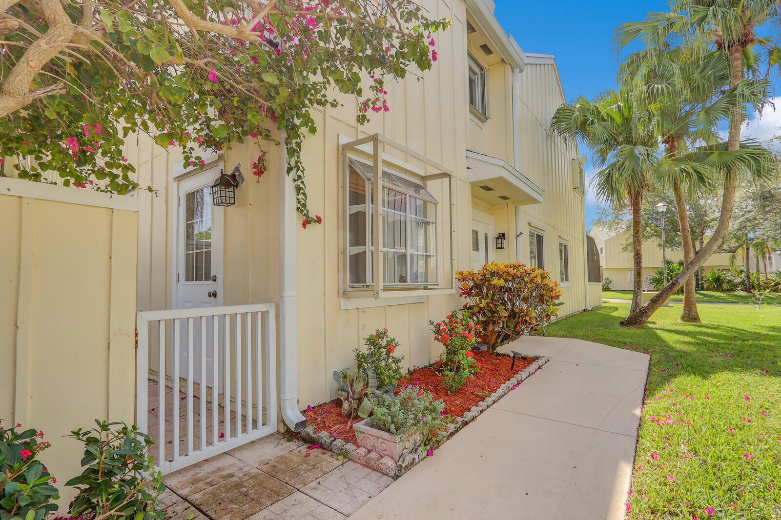 Come and see this spacious corner unit with 2 bedroom and 2-1/2 bathrooms in the beautiful Waterfront Riverwalk Community. The unit has been totally fresh painted and has many upgrades. New roof 2024. Beautiful new impact front door. The kitchen has been updated and appliances are top of the line a year old. The pantry shelves pull out for easy access. Spacious living and dining area with porcelain title flooring. There are two patios for enjoyment. Walk to the pool that is in the back of the unit. The second floor has two oversized primary bedrooms, each with remodeled bathrooms. Extra room in the attic storage. Riverwalk community offers boating, kayaking, and paddleboarding for outside enjoyment. Only a few minutes away from Jupiter Beaches and Restaurants for enjoyment.