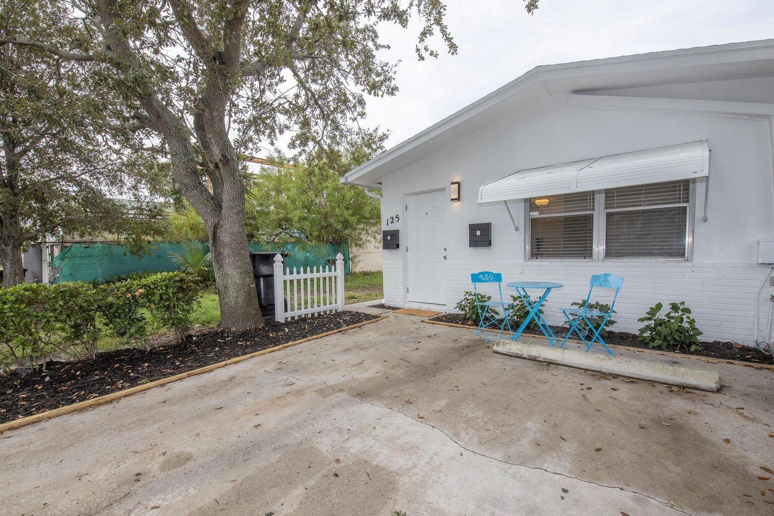 A MUST SEE!!!! NEWLY UPDATED PRIVATE UNIT LOCATED ONE BLOCK OFF LAKE AVE IN DOWNTOWN LAKE WORTH BEACH. THIS LARGE 2 BEDROOMS 1 BATH COMES WITH 2 ASSIGNED OFF STREET PARKING, OUTSIDE SEATING AREA, ALL NEW IMPACT WINDOWS, IMPACT DOORS, PORCELAIN FLOOR TILES THROUGHOUT THE UNIT. NEW KITCHEN (ALL NEW SHAKER KITCHEN CABINETS) WITH STAINLESS APPLIANCE (RANGE, REF, OVERHEAD MICRO, DISHWASHER), WALK IN CLOSET, ALL NEW BATHROOM, WASHER AND DRYER IN UNIT (LAUNDRY ROOM)! TON OF CLOSET SPACE. NEW CENTRAL A/C. NEW FANS, ALL LED'S, UNIT LOCATED CLOSE TO ALL THAT DOWNTOWN LAKE WORTH BEACH HAS TO OFFER. COME MAKE THIS YOUR HOME.