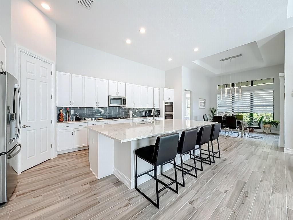 Photo of 11795 Vivar Run, Parkland, FL 33076 (MLS # F10533141)