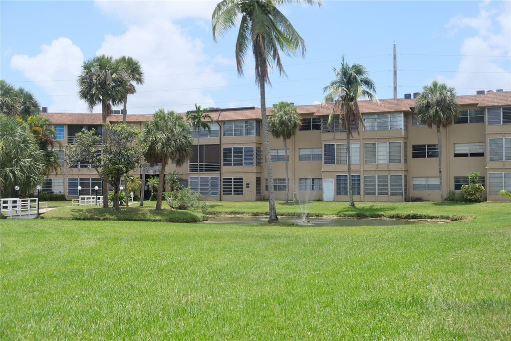 Photo of 5031 W Oakland Park Boulevard #105, Lauderdale Lakes, FL 33313 (MLS # F10479334)