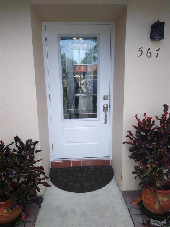 Photo of 567 Covered Bridge Boulevard Blvd #567, Lake Worth Beach, FL 33467 (MLS # R10682605)