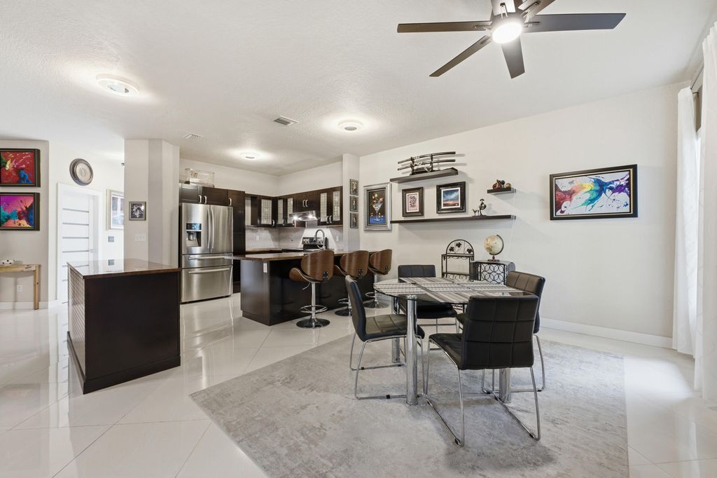 Photo of 5673 NW 117th Avenue, Coral Springs, FL 33076 (MLS # B26041981)