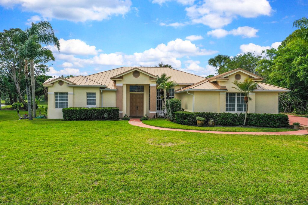 Photo of 2987 Conifer Drive, Fort Pierce, FL 34951 (MLS # B26012135)