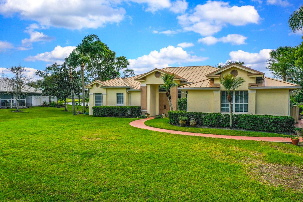 Photo of 2987 Conifer Drive, Fort Pierce, FL 34951 (MLS # B26012135)