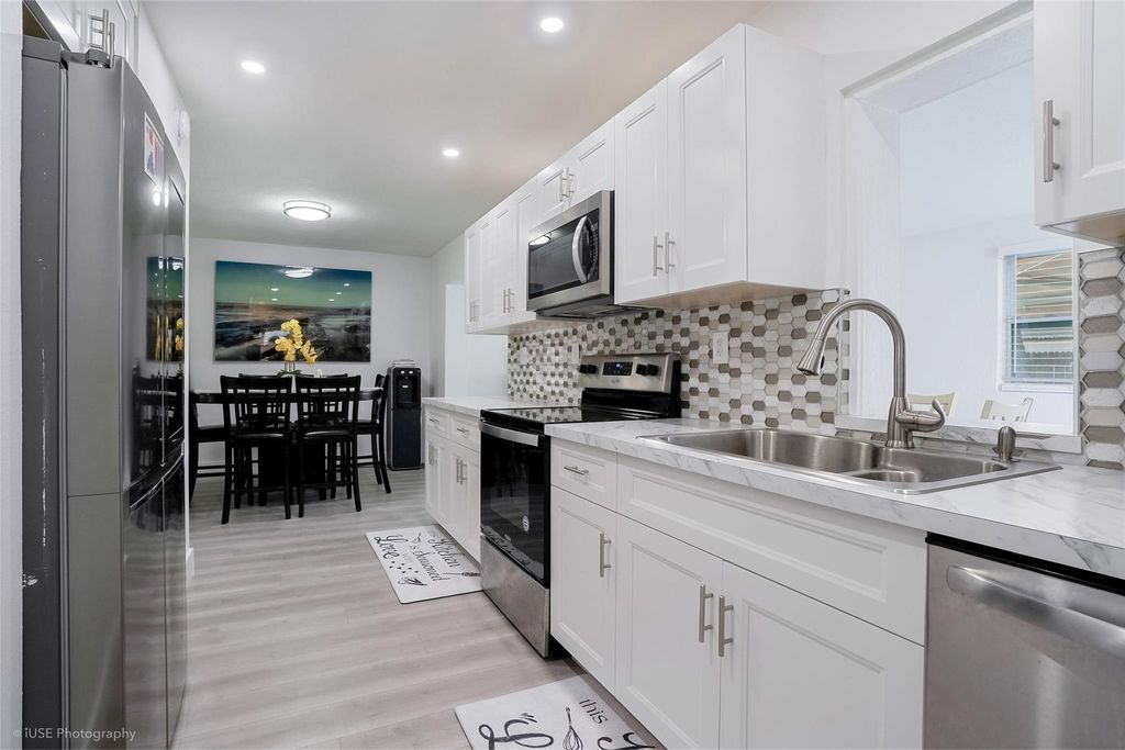 Photo of 1211 NW 50th Ave, Lauderhill, FL 33313 (MLS # F10532411)