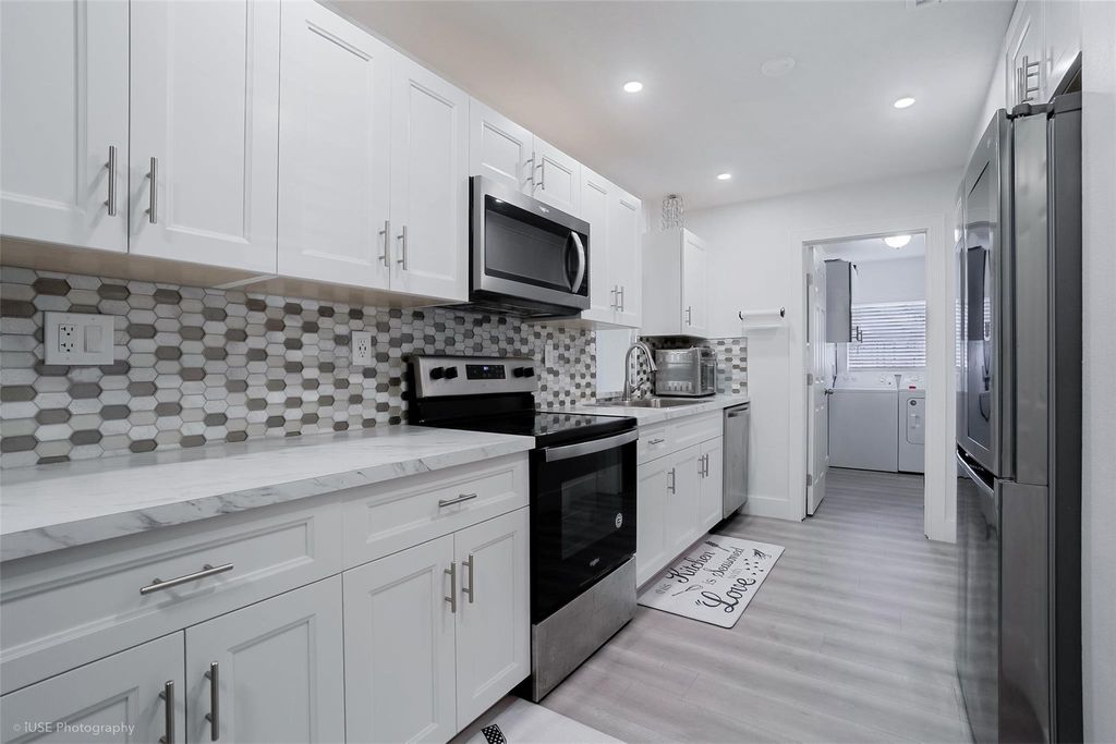 Photo of 1211 NW 50th Ave, Lauderhill, FL 33313 (MLS # F10532411)