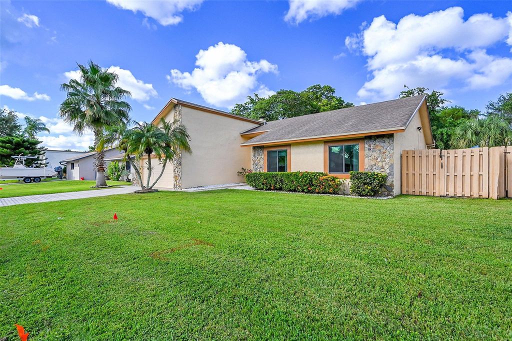 Photo of 5411 NW 87th Ave, Lauderhill, FL 33351 (MLS # F10532895)