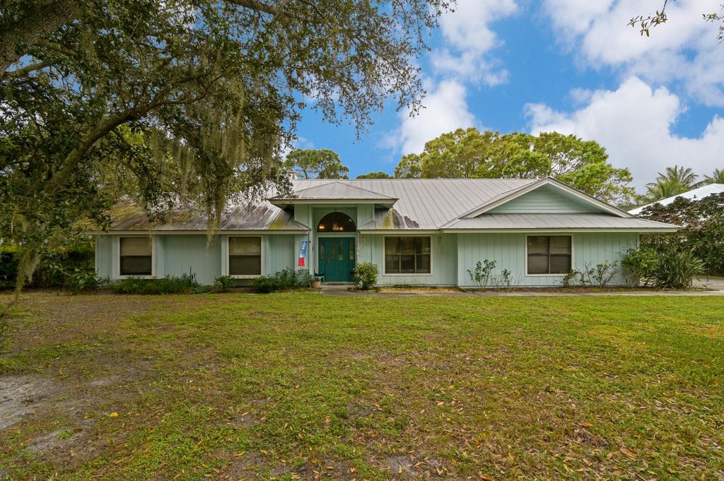 Photo of 1146 SW Magnolia Bluff Drive, Palm City, FL 34990 (MLS # R10774310)