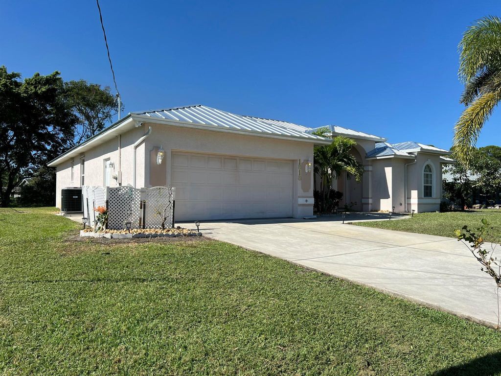 Photo of 1818 SE Camden Street, Port Saint Lucie, FL 34952 (MLS # R11040572)