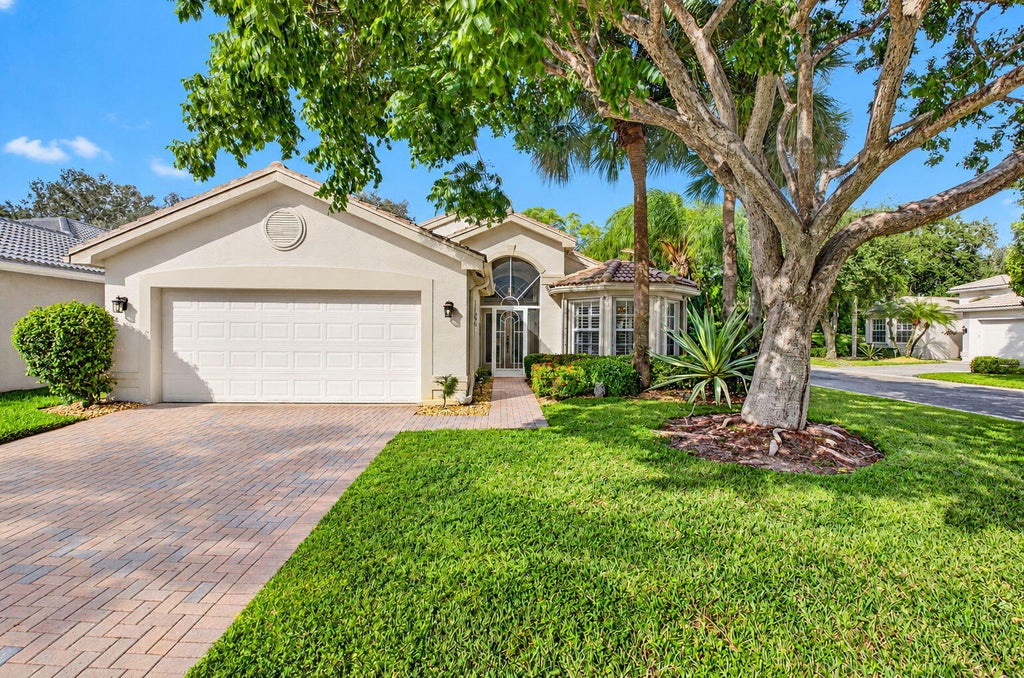 Photo of 7543 Pebble Shores Terrace, Lake Worth, FL 33467 (MLS # B26093495)