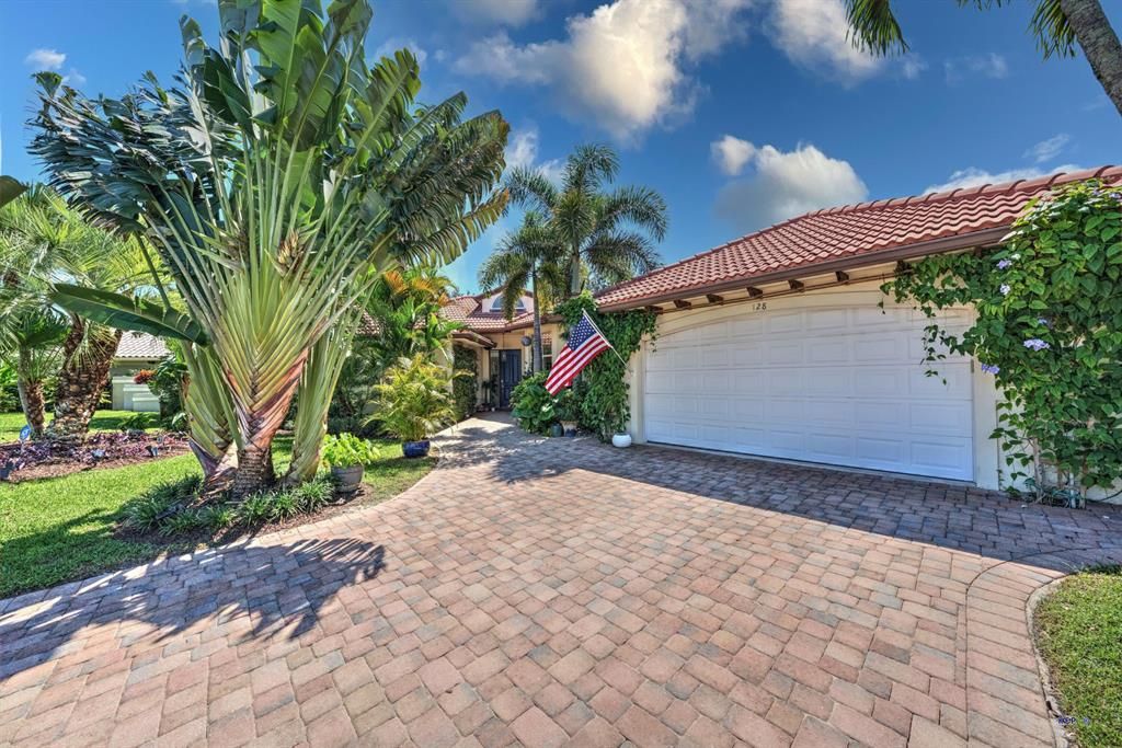 Photo of 128 Orion Circle, Jupiter, FL 33477 (MLS # R10748664)