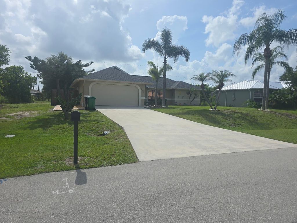 Photo of 3625 SW Vincennes Street, Port Saint Lucie, FL 34953 (MLS # R11107436)