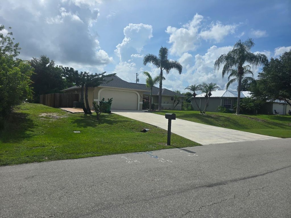 Photo of 3625 SW Vincennes Street, Port Saint Lucie, FL 34953 (MLS # R11107436)