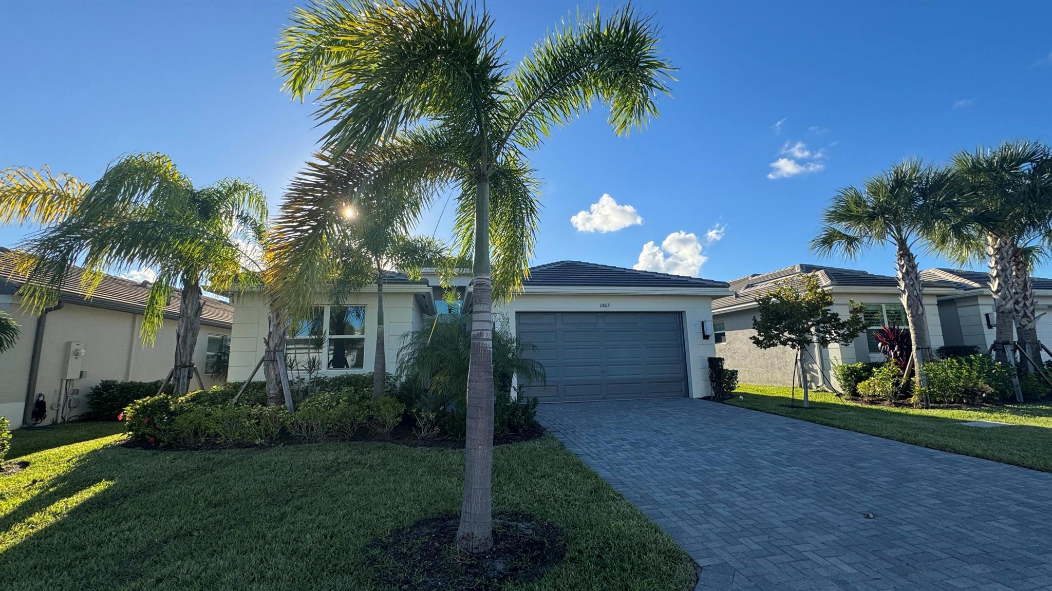 Valencia Cay at Riverland! This Bimini floor plan features 4 bedrooms, 3 full bathrooms has unparalleled features and meticulous attention to detail. Beautiful wide open floor plan with spacious gourmet kitchen that includes quartz countertops, contemporary glass subway tile backsplash, dove grey maple cabinets w/ soft close doors and drawers, custom cabinet pantry built-in, and stainless-steel appliances, gas stove and canopy style hood This home is loaded from top to bottom with high end finishes, remote ambient shades, recessed LED lighting, custom mirror and designer fixtures. Well appointed porcelain 24x24 tile flooring throughout. There is a relaxing screened porch, and private yard that is perfect for morning coffee. There is complete storm protection with impact glass windows