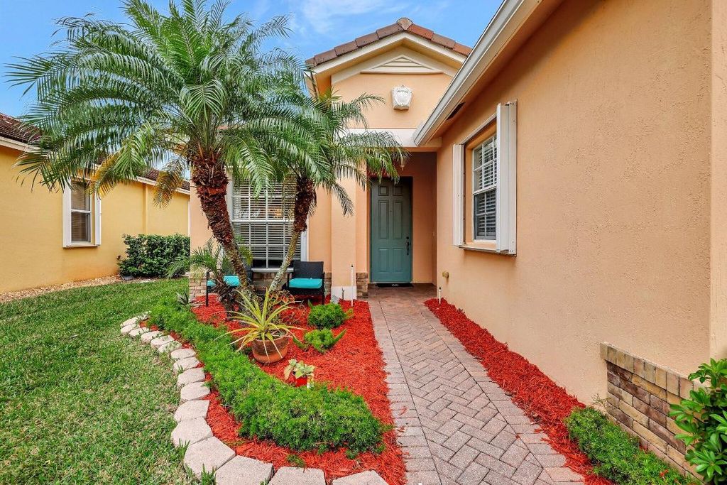 Photo of 9630 SW Flowermound Circle, Port Saint Lucie, FL 34953 (MLS # R11157947)