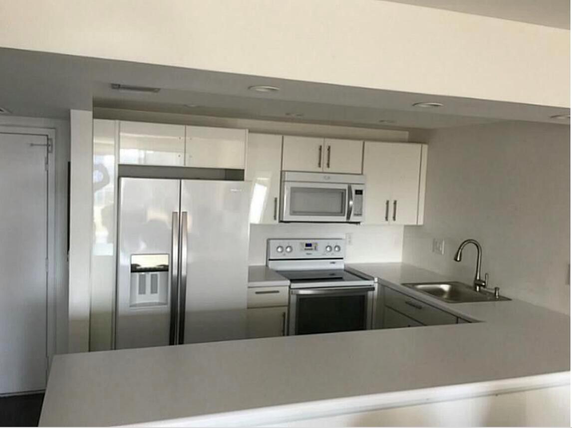 Enjoy stunning direct ocean and intracoastal views from this fully renovated condo, featuring an open layout, modern kitchen, and elegant ''wood'' floors throughout. Both bathrooms are sleek and contemporary, offering a clean, refined feel.Live the resort lifestyle with two heated pools, tennis courts, a marina, fitness center, and lush landscaped grounds. Covered parking, extra storage, and 24-hour security included.Minutes from beaches, Aventura Mall, and top-tier dining. Refined, coastal living at its best.