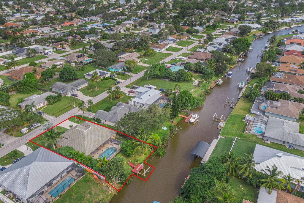 Photo of 118 NE Surfside Avenue, Port Saint Lucie, FL 34983 (MLS # R10926143)