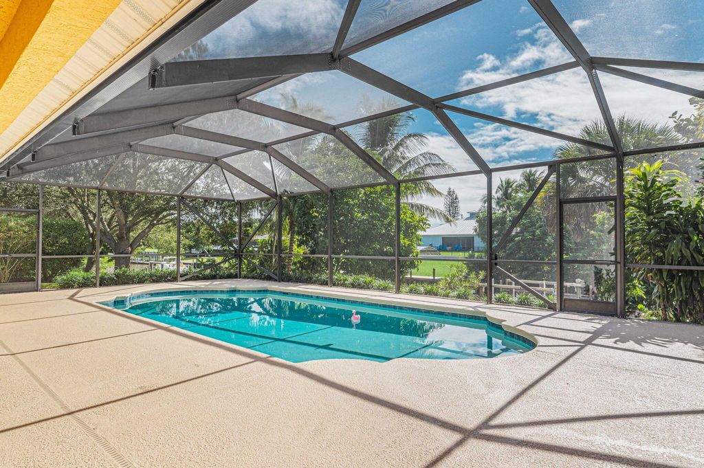 Photo of 118 NE Surfside Avenue, Port Saint Lucie, FL 34983 (MLS # R10926143)