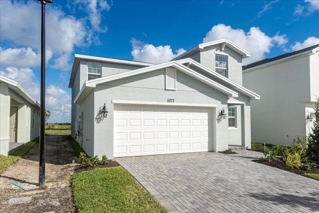 Photo of 11177 NW Fernbrook Drive, Port Saint Lucie, FL 34987 (MLS # R11097664)