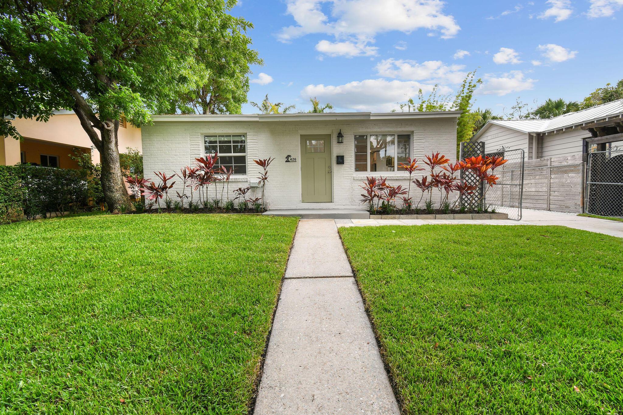 Exceptionally renovated 2/1 home located on a peaceful tree lined street in Northwood, just one block from the intracoastal. This bright and airy home has undergone a complete renovation and is ready for its next owner. The home also had many upgrades completed in 2018, including a new roof, a new air conditioning system, and a new hot water heater. Enjoy the spacious landscaped backyard which is perfect for entertaining and includes a screened in patio and two sheds for storage. 426 48th Street is within steps of Osprey Park, the new Icon Marina Village, and pre-construction Alba Palm Beach Condominiums. Only a short drive to downtown West Palm Beach, trendy Northwood Village with top rated restaurants, PBI Airport and public transportation. Call to schedule your tour today!