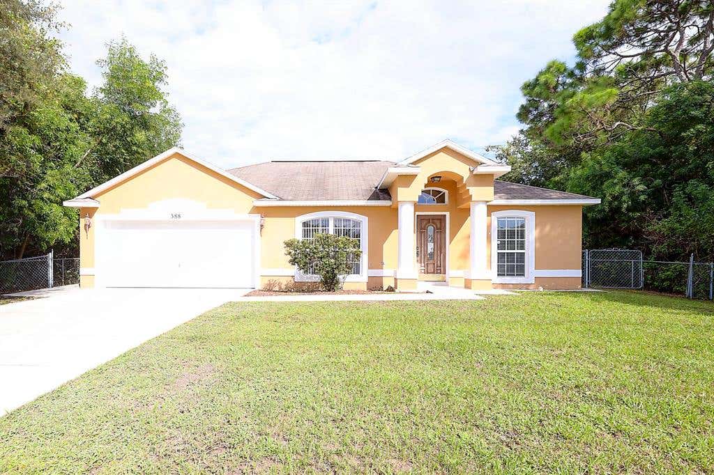 Photo of 388 SW Tulip Boulevard, Port Saint Lucie, FL 34953 (MLS # R10749428)