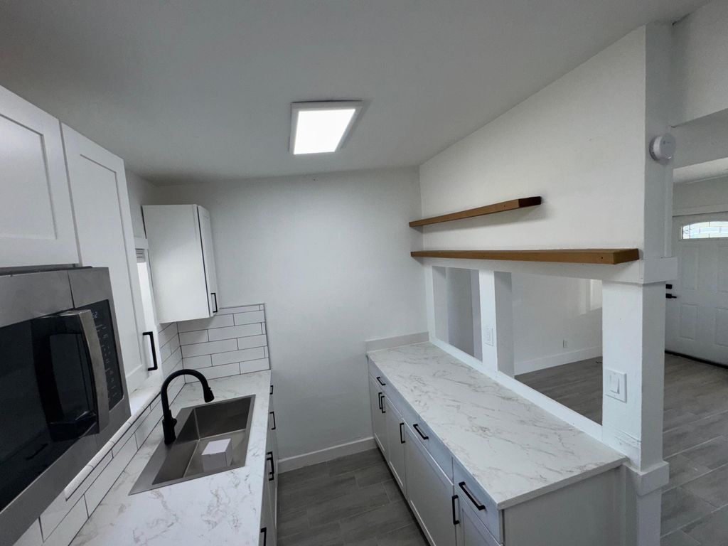 Photo of 171 Loquat Tree Drive, Lantana, FL 33462 (MLS # R11066033)