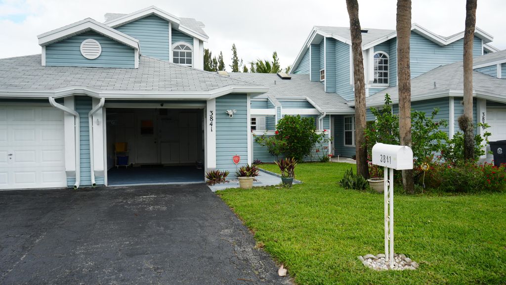 Photo of 3841 Island Club Circle E, Lake Worth, FL 33462 (MLS # B26014273)
