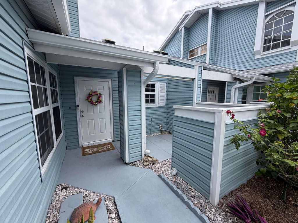 Photo of 3841 Island Club Circle E, Lake Worth, FL 33462 (MLS # B26014273)