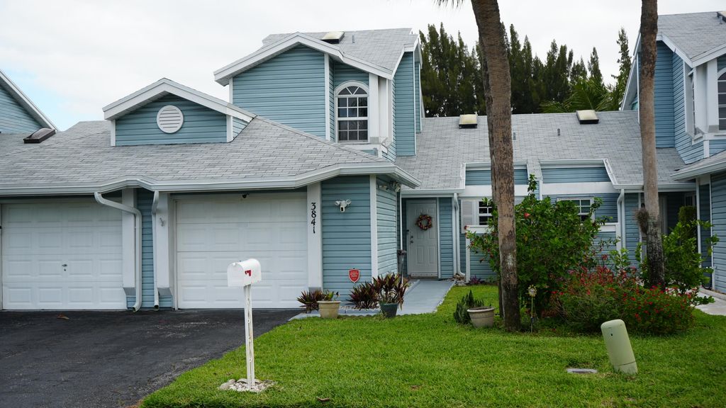 Photo of 3841 Island Club Circle E, Lake Worth, FL 33462 (MLS # B26014273)
